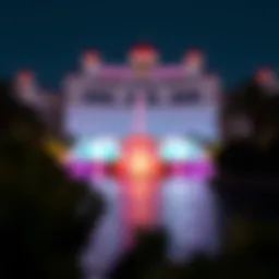 A stunning view of La Fontana Dubai at night, showcasing its vibrant water displays illuminated by colorful lights.