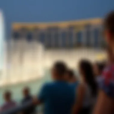 Spectators Captivated by the La Fontana Show Visitors enjoying the mesmerizing water show at La Fontana, capturing their awe and admiration.